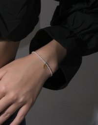 Браслет из жемчуга майорка с золотистой буквой D